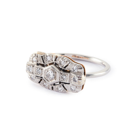 Beautiful Art Deco platinum and 18ct rose gold ring set with thirteen old-cut diamonds in an ornate setting.