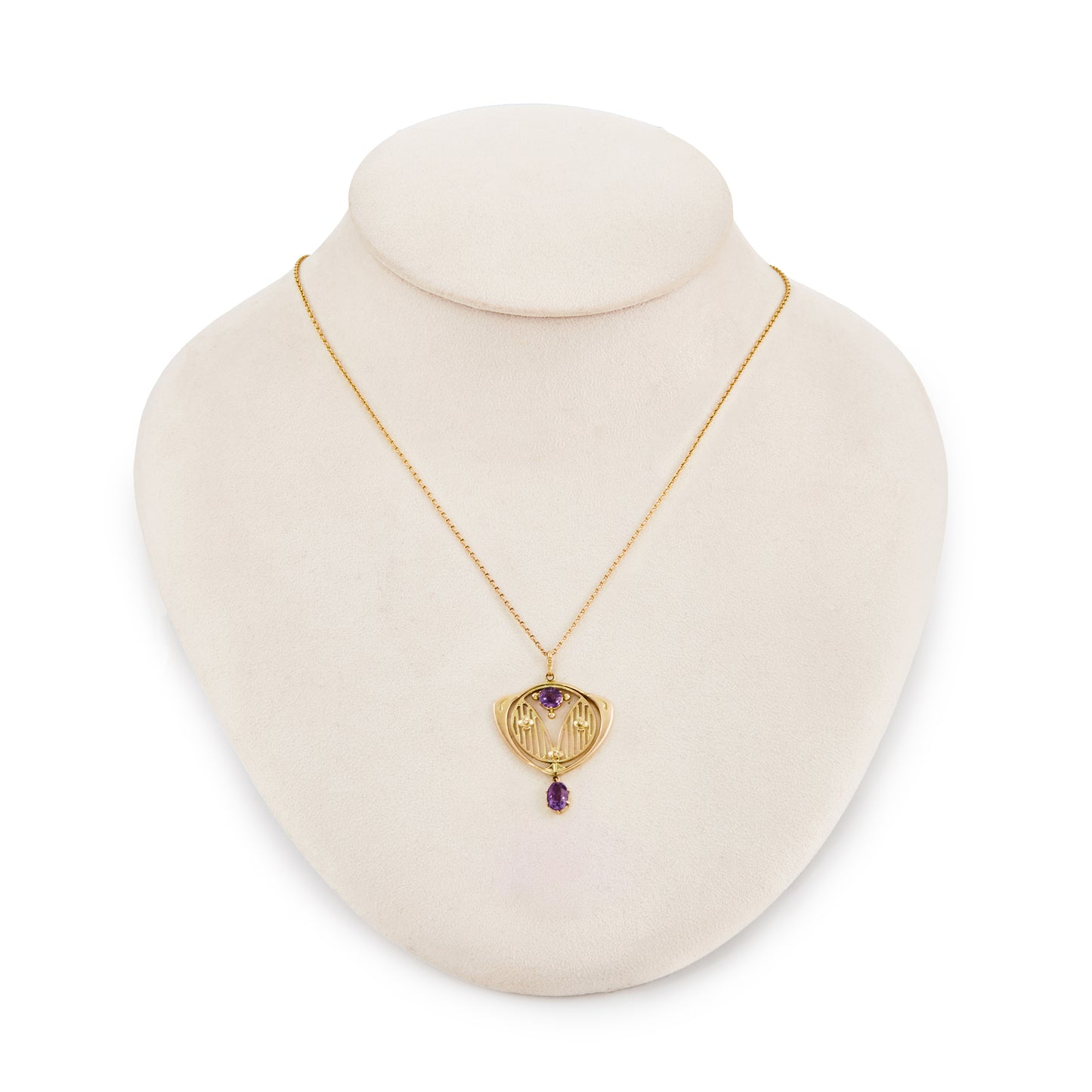 Exquisite Arts and Crafts 9ct gold pendant set with two faceted amethysts, on a 9ct gold belcher link chain with a barrel clasp.