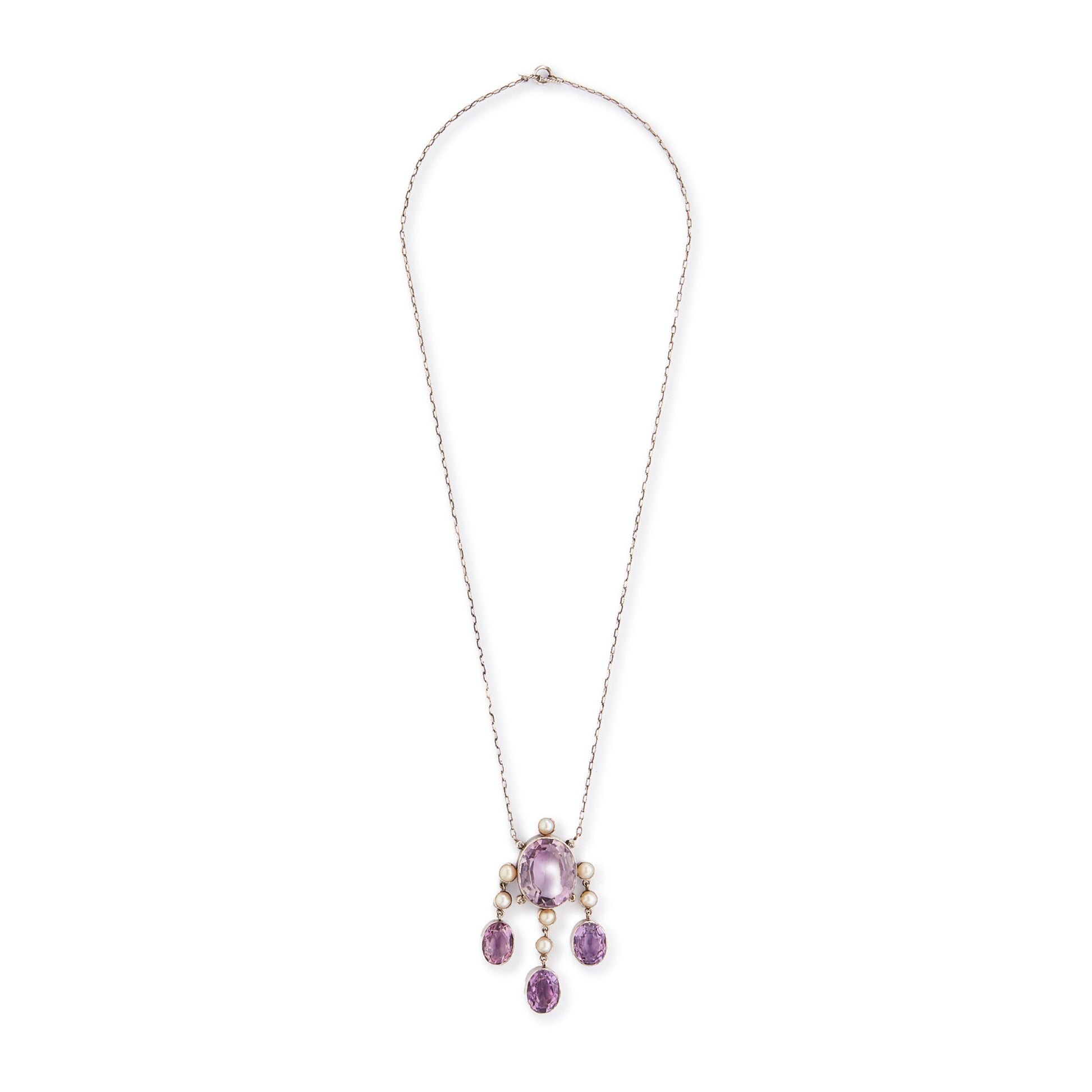 Beautiful Arts and Crafts silver necklace set with four chunky purple faceted amethysts, seven lustrous pearls and four tiny mine-cut diamonds. The necklace has a lovely toggle clasp.
