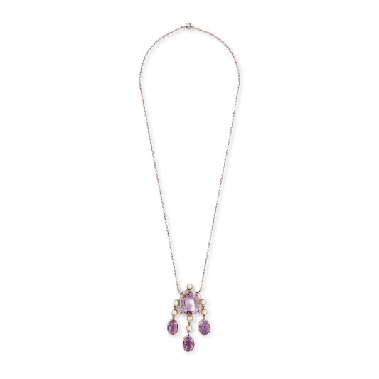 Beautiful Arts and Crafts silver necklace set with four chunky purple faceted amethysts, seven lustrous pearls and four tiny mine-cut diamonds. The necklace has a lovely toggle clasp.