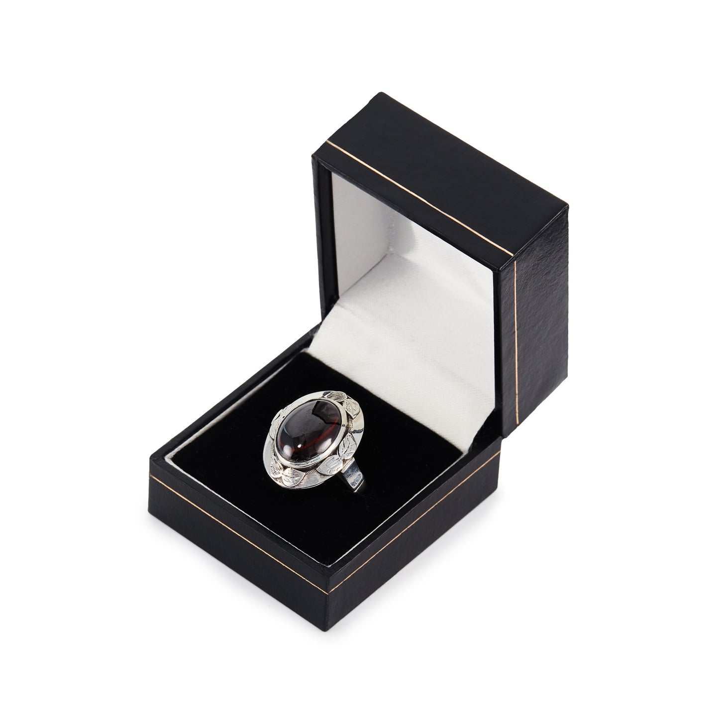 Lovely silver Arts and Crafts ring, set with a deep red oval cabochon garnet in an engraved leaf setting.