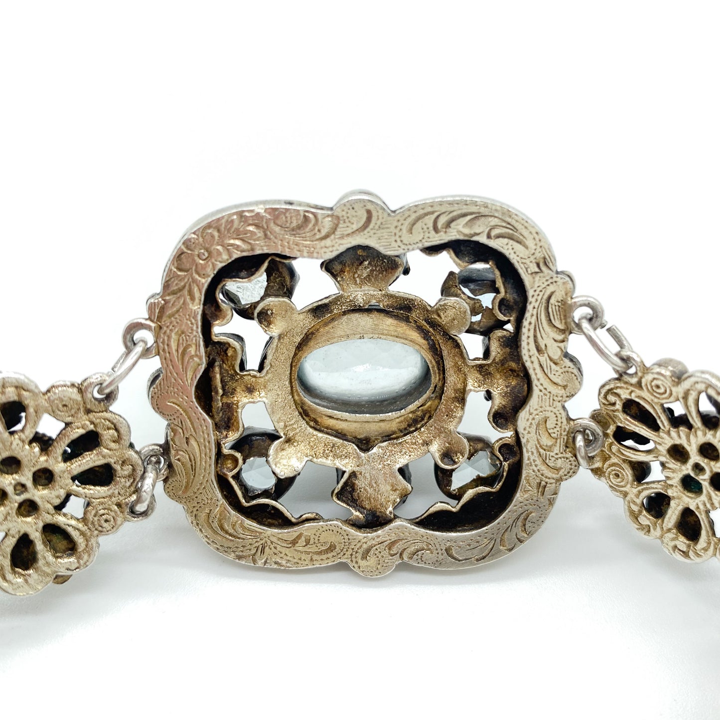 Stunning silver gilt Austro-Hungarian bracelet set with eight faceted aquamarines, twenty six garnets and four half pearls. Safety chain attached. Circa 1900’s