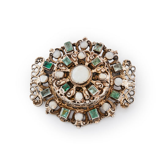 Magnificent Austro-Hungarian silver gilt brooch with a very unusual hidden compartment, set with twelve rough cut emeralds and thirteen pearl/mother of pearl discs. Beautiful filigree detail. Later brooch fitting. Circa 1890