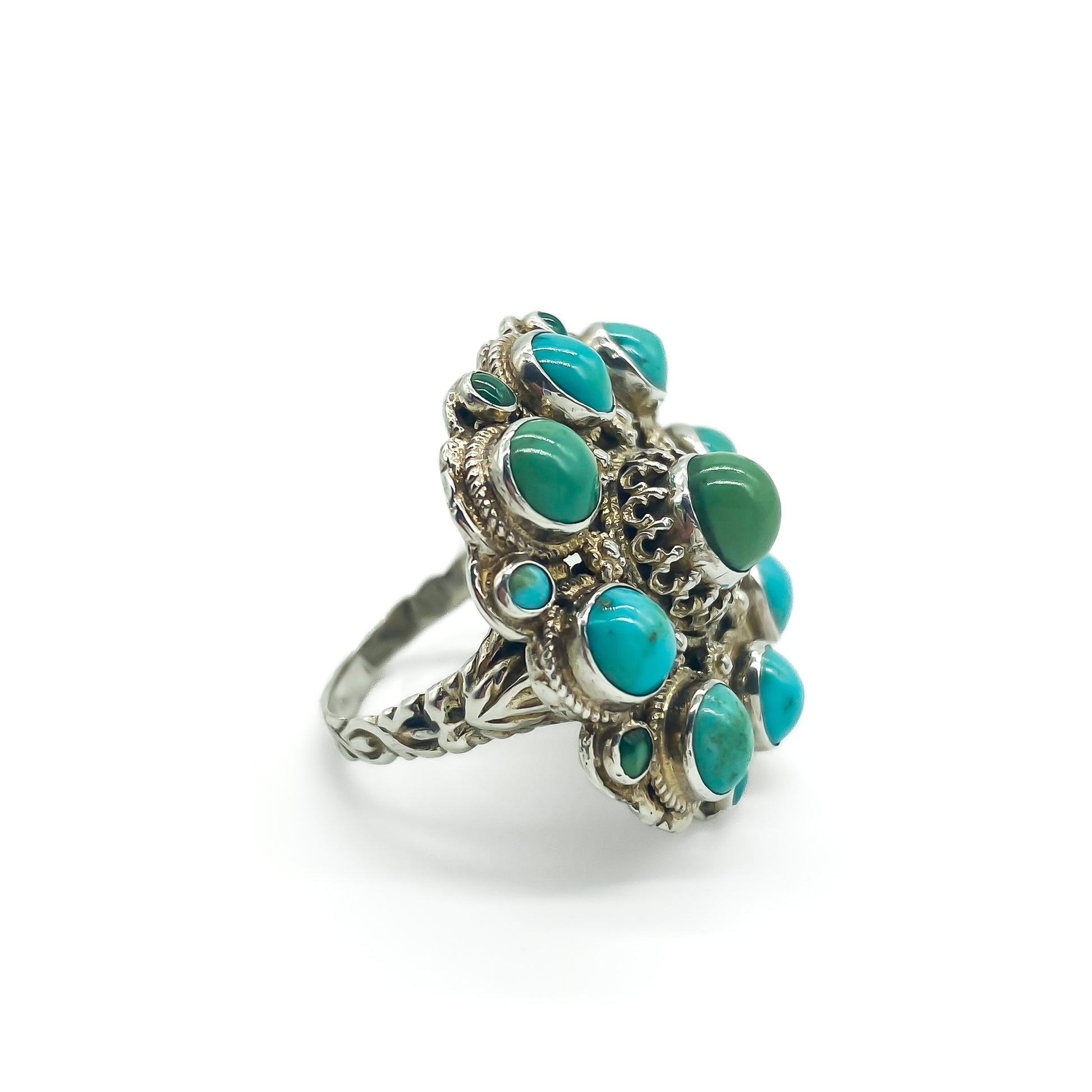 Gorgeous Austro-Hungarian silver gilt ring set with natural turquoise stones. Circa 1910