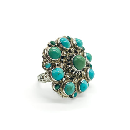 Gorgeous Austro-Hungarian silver gilt ring set with natural turquoise stones. Circa 1910