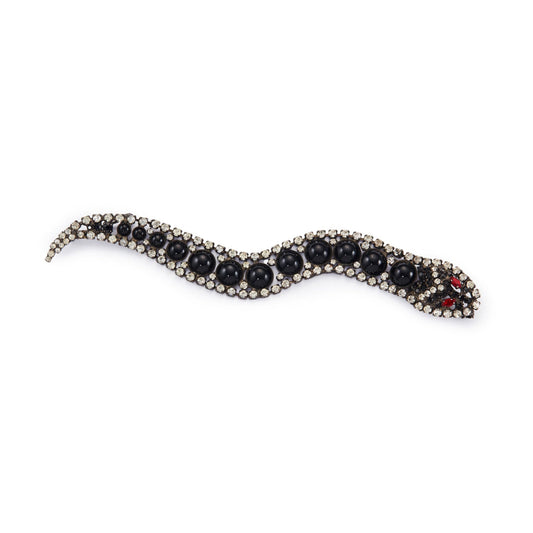 Glamorous vintage Butler and Wilson articulated snake brooch with two pins. A stunning statement designer piece, ideal to be worn over the shoulder. England