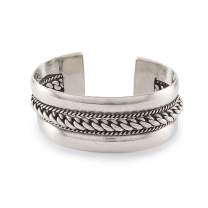Magnificent and heavy sterling silver bangle with a rope design. Ideal for either men or women. The bangle is open so the size is slightly adjustable. Circa 1950s