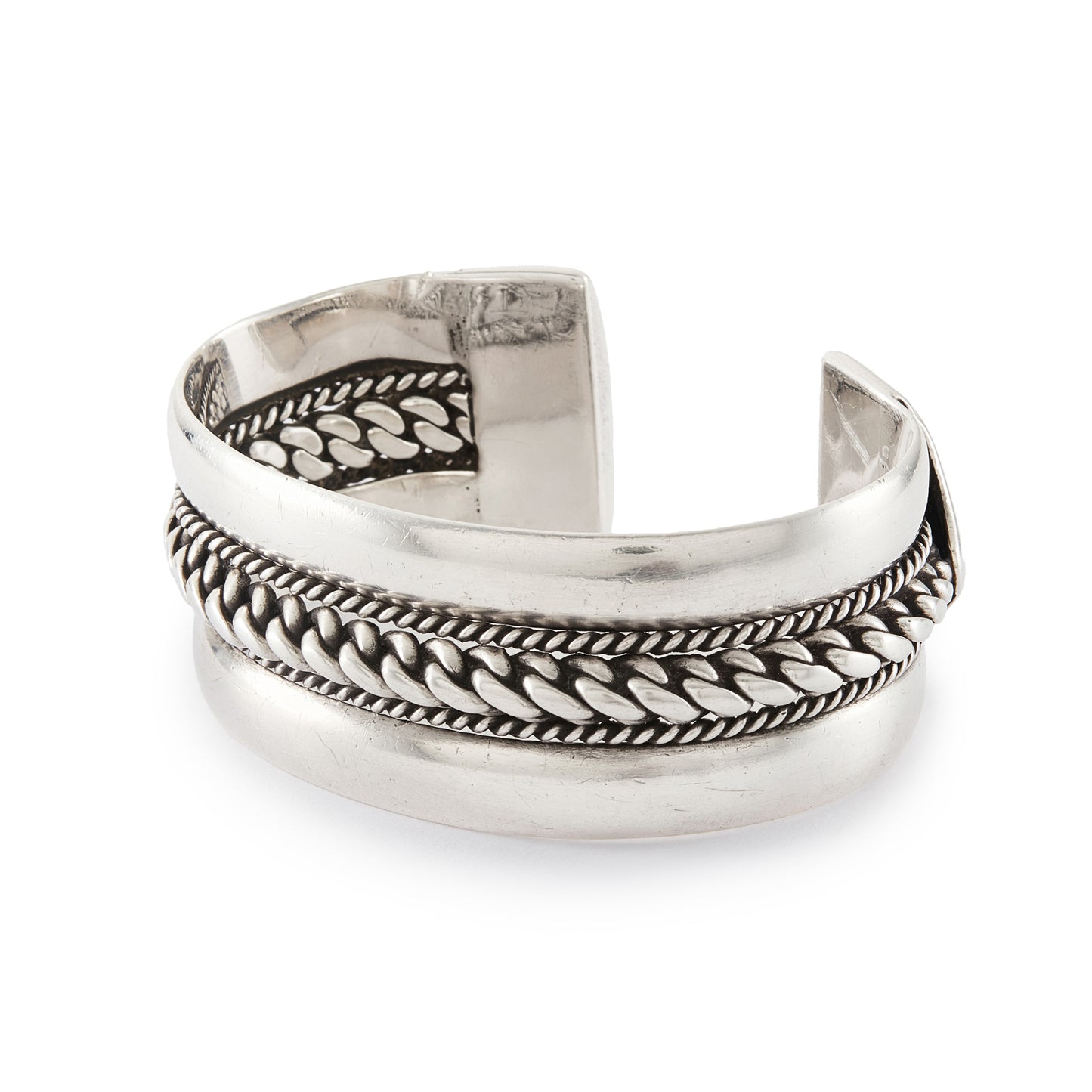 Magnificent and heavy sterling silver bangle with a rope design. Ideal for either men or women. The bangle is open so the size is slightly adjustable. Circa 1950s