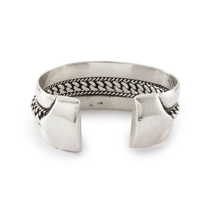 Magnificent and heavy sterling silver bangle with a rope design. Ideal for either men or women. The bangle is open so the size is slightly adjustable. Circa 1950s
