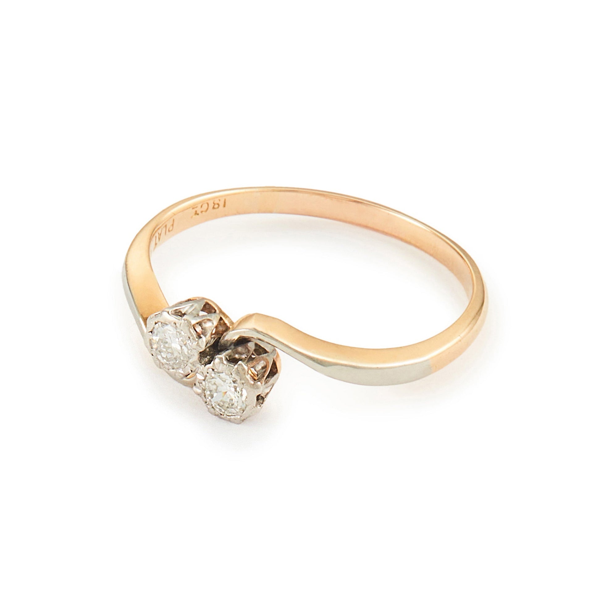 Classic Edwardian 18ct gold Toi et Moi ring with two old-cut 0.10ct diamonds in a platinum setting.