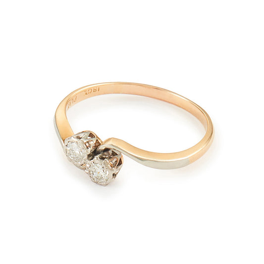 Classic Edwardian 18ct gold Toi et Moi ring with two old-cut 0.10ct diamonds in a platinum setting.