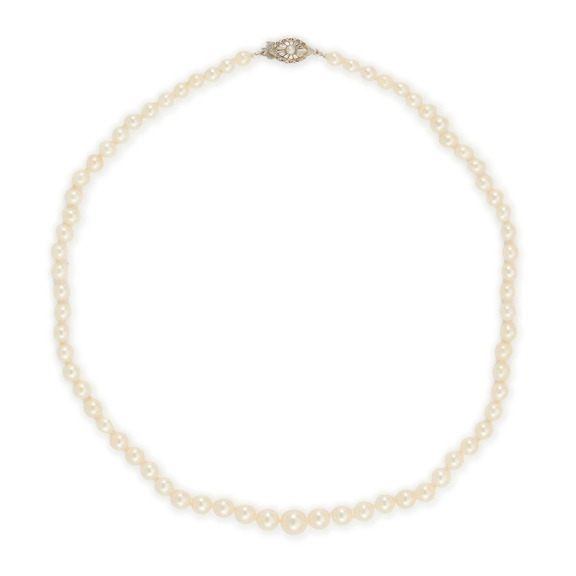 Lovely string of cultured seawater pearls with a sterling silver clasp set with a seed pearl. The pearls have a cream hue with a lovely lustre.