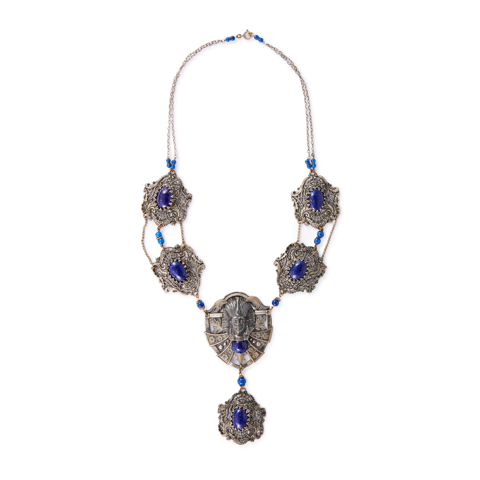 Magnificent Egyptian Revival necklace set with faux cabochon lapis lazuli stones. Base metal featuring lots of intricate detail with a Pharaoh's head. Circa 1920’s