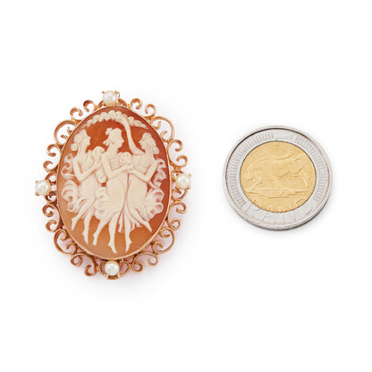 Charming Edwardian 10ct rose gold brooch depicting the Three Graces dancing merrily together. Surrounded by beautiful scrollwork and four pearls. Can also be worn as a pendant.