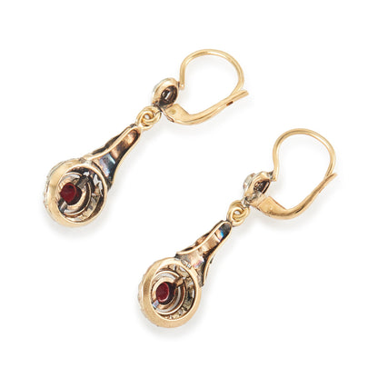 Exquisite Edwardian 18ct gold earrings each set with a natural diamond and a garnet, with ornate detail. Italy