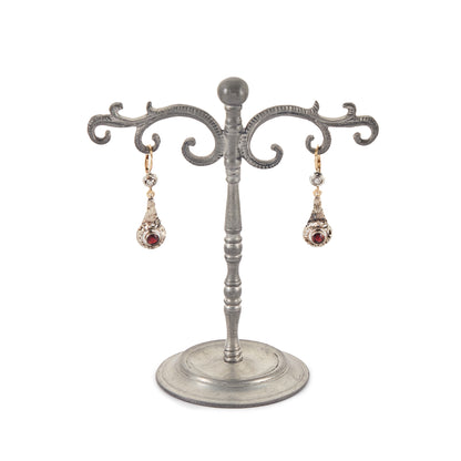 Exquisite Edwardian 18ct gold earrings each set with a natural diamond and a garnet, with ornate detail. Italy