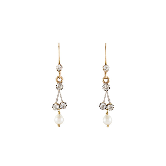 Dainty Edwardian 18ct yellow, rose and white gold drop earrings, each set with four old cut diamonds and a pearl drop.