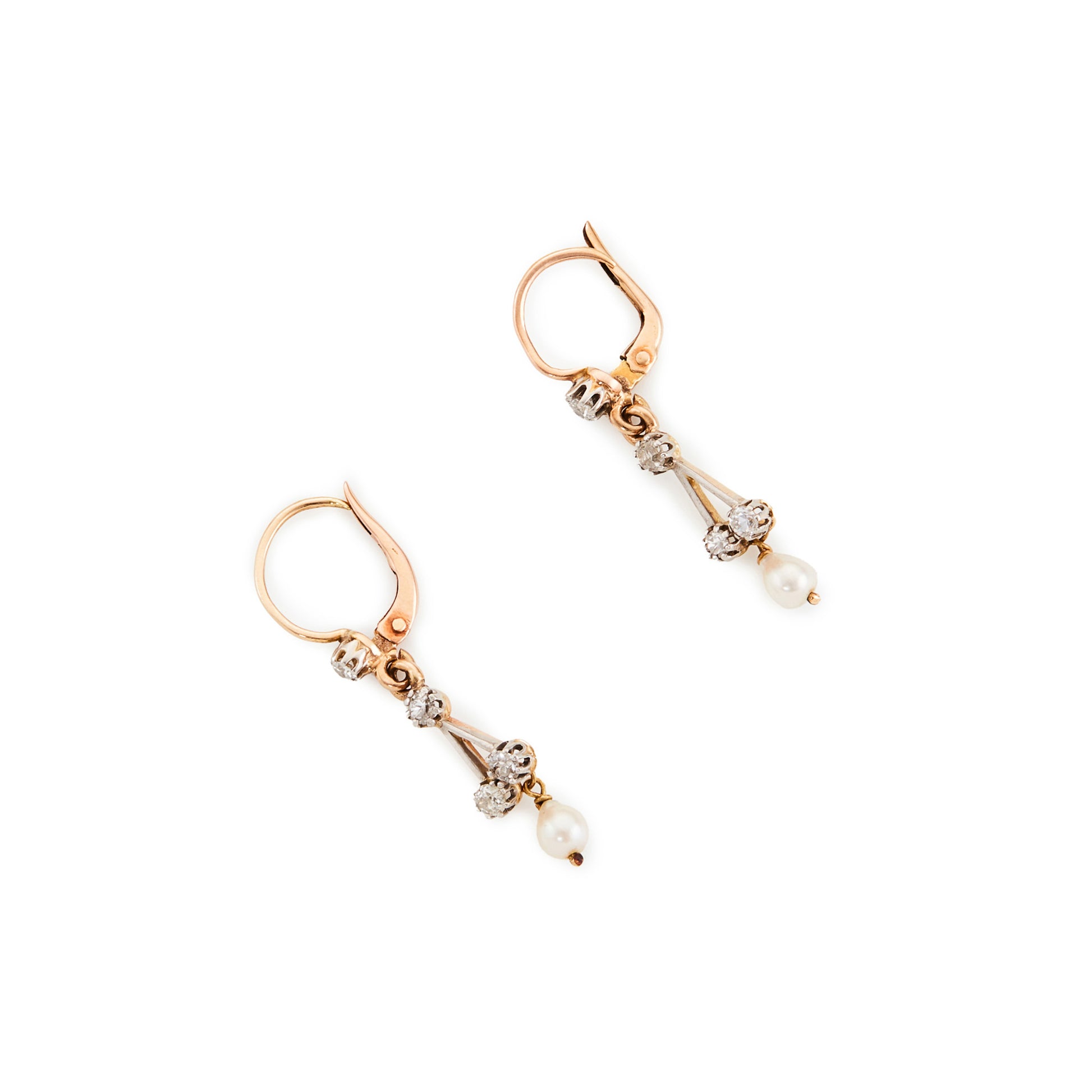 Dainty Edwardian 18ct yellow, rose and white gold drop earrings, each set with four old cut diamonds and a pearl drop.