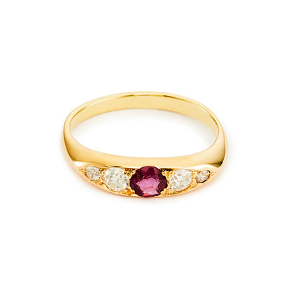 Classic Edwardian 18ct gold ring set with a beautiful centre 0.20ct ruby, with two natural, old-cut diamonds on each shoulder. Ideal for stacking.