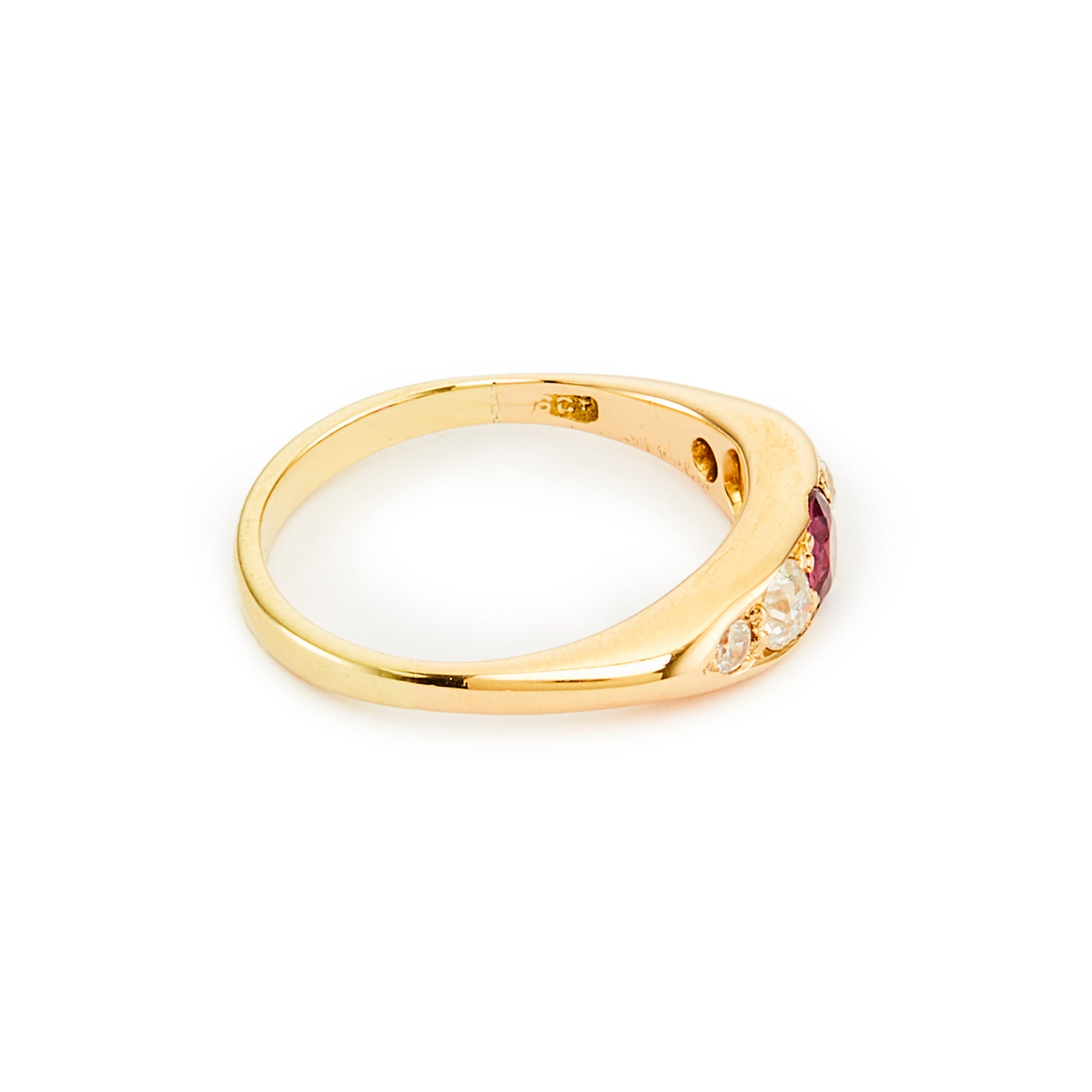 Classic Edwardian 18ct gold ring set with a beautiful centre 0.20ct ruby, with two natural, old-cut diamonds on each shoulder. Ideal for stacking.