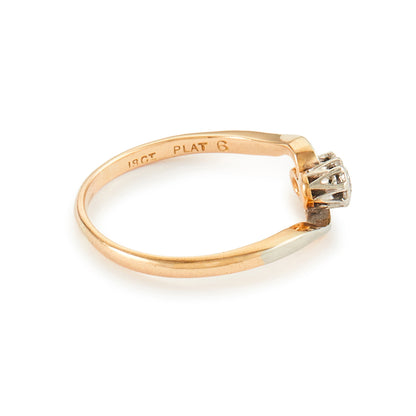 Classic Edwardian 18ct gold Toi et Moi ring with two old-cut 0.10ct diamonds in a platinum setting.