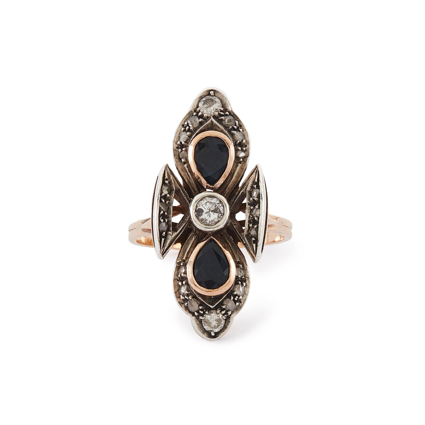 Gorgeous Edwardian 18ct rose gold and silver ring set with three round old-European-cut diamonds, two teardrop sapphires and eighteen smaller mine-cut diamond chips. The centre old-cut diamond has a natural inclusion that adds character to the piece.