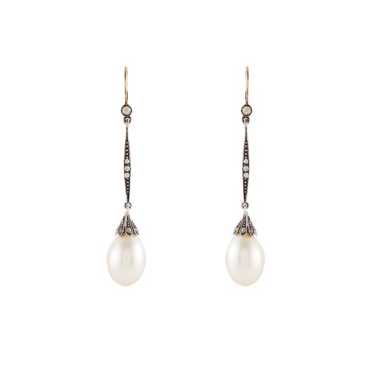 Exquisite Edwardian 18ct gold and silver earrings, each set with seven paste stones and a luminous pearl drop. 