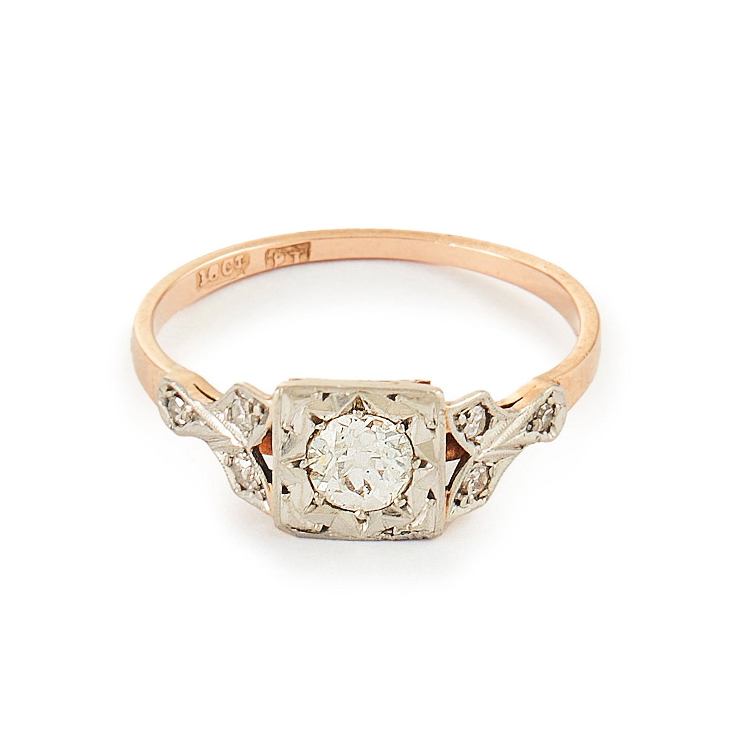 Pretty Edwardian 18ct rose gold ring set with a 0.30ct natural diamond with small inclusions.