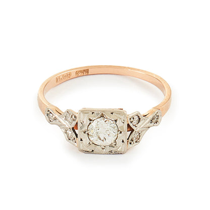 Pretty Edwardian 18ct rose gold ring set with a 0.30ct natural diamond with small inclusions.