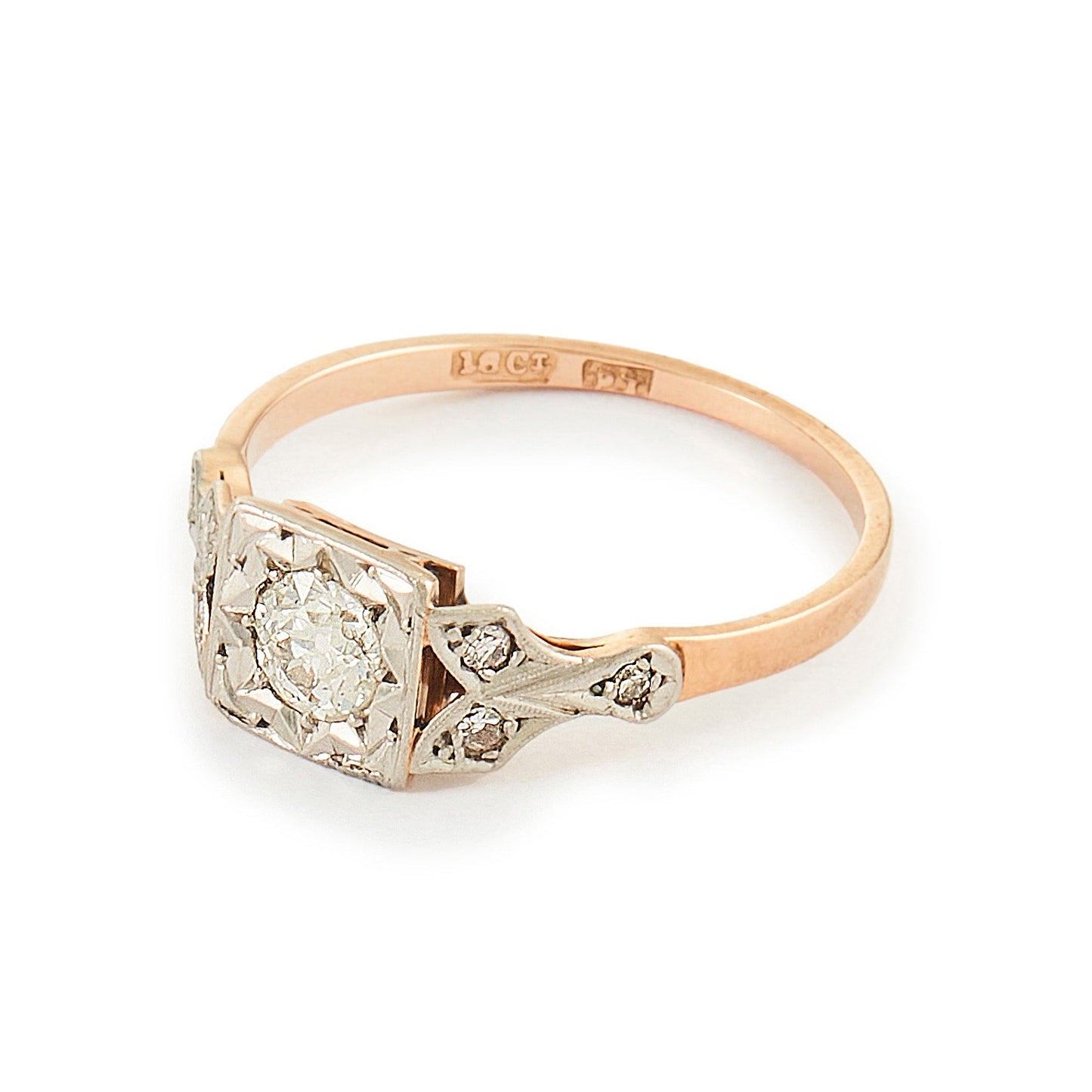 Pretty Edwardian 18ct rose gold ring set with a 0.30ct natural diamond with small inclusions.