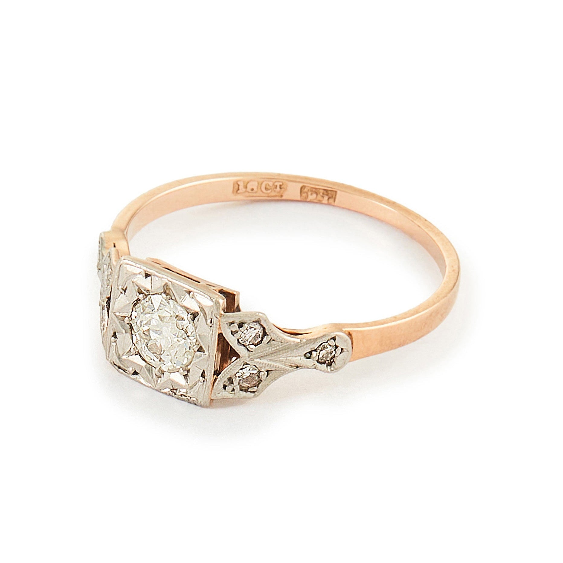 Pretty Edwardian 18ct rose gold ring set with a 0.30ct natural diamond with small inclusions.