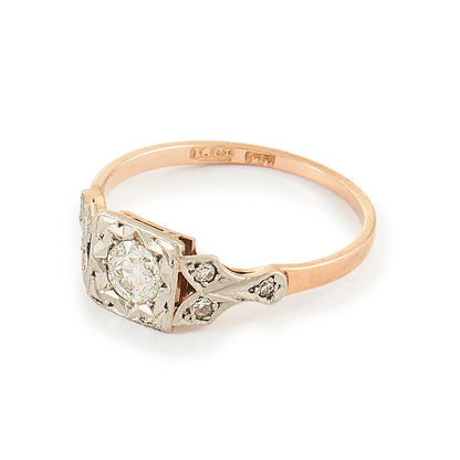 Pretty Edwardian 18ct rose gold ring set with a 0.30ct natural diamond with small inclusions.