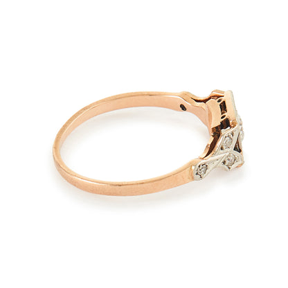Pretty Edwardian 18ct rose gold ring set with a 0.30ct natural diamond with small inclusions.