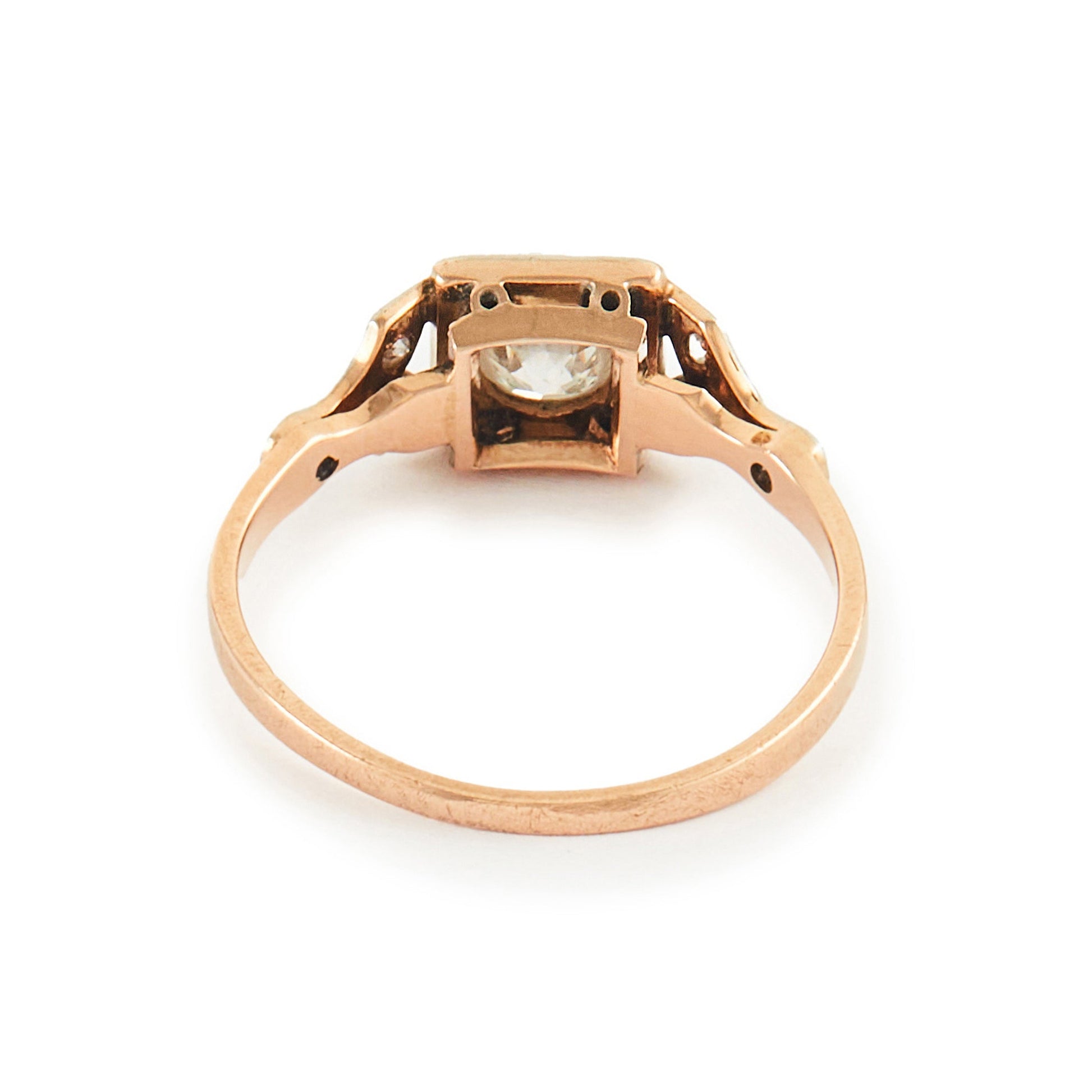 Pretty Edwardian 18ct rose gold ring set with a 0.30ct natural diamond with small inclusions.