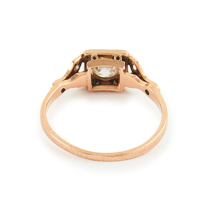 Pretty Edwardian 18ct rose gold ring set with a 0.30ct natural diamond with small inclusions.