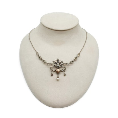 Intricate Edwardian 18ct gold and silver festoon necklace set with two cultured pearls and a variety of paste stones.