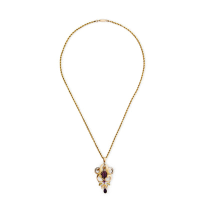 Beautiful Edwardian 9ct rose and yellow gold pendant, set with three faceted amethysts, on a 9ct gold rope chain with a barrel clasp.