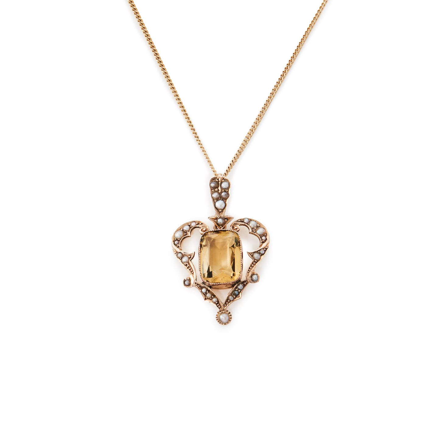 Gorgeous Edwardian 9ct gold pendant set with a beautiful cushion cut citrine surrounded by seed pearls. On a 9ct gold chain.