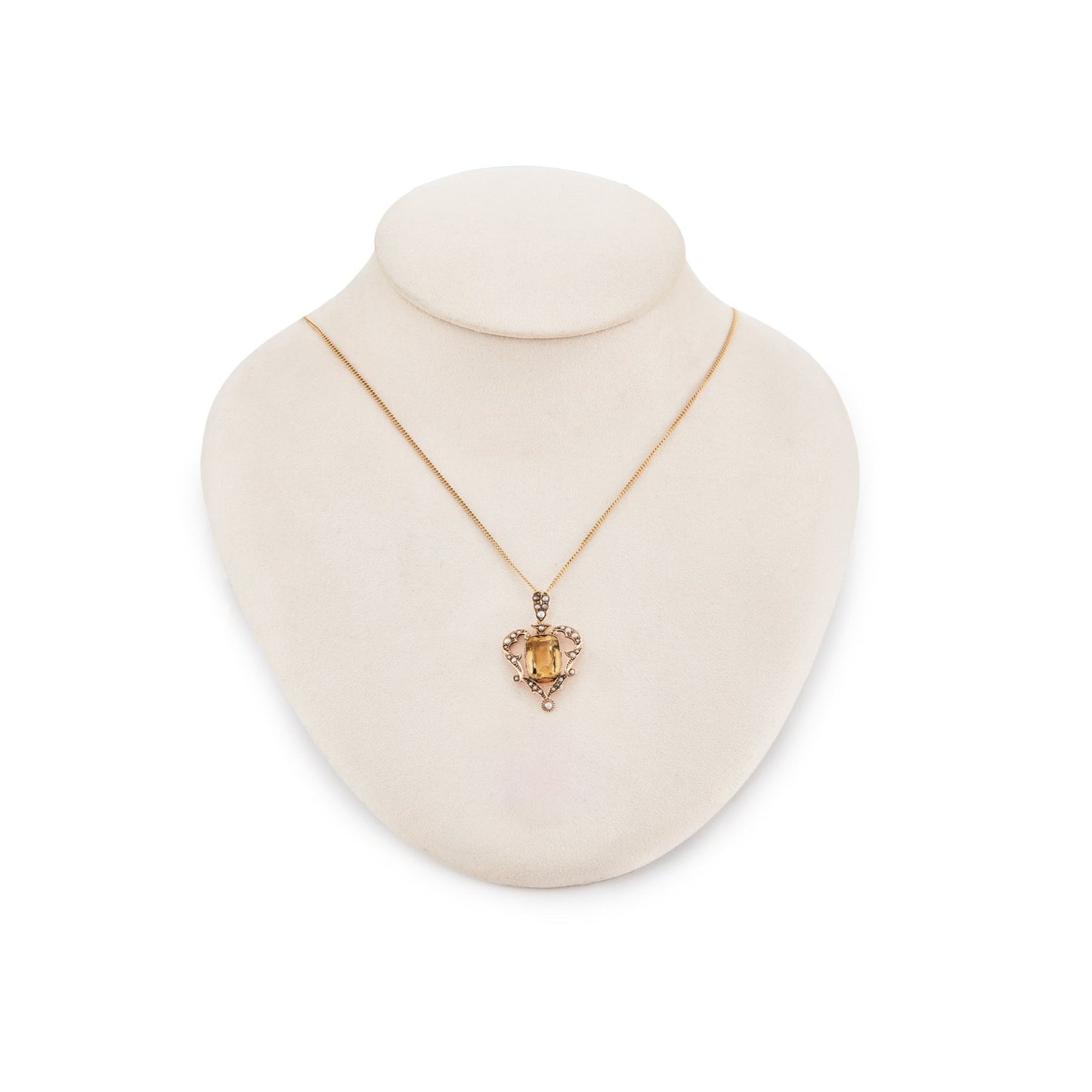 Gorgeous Edwardian 9ct gold pendant set with a beautiful cushion cut citrine surrounded by seed pearls. On a 9ct gold chain.