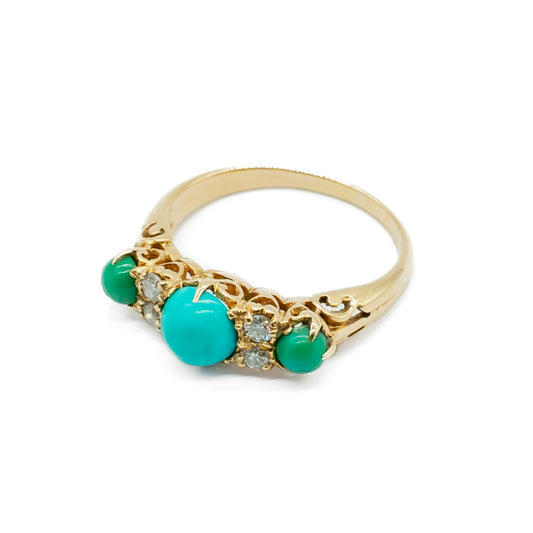 Beautiful Edwardian 9ct gold ring set with three cabochon turquoise stones and four faceted diamonds.