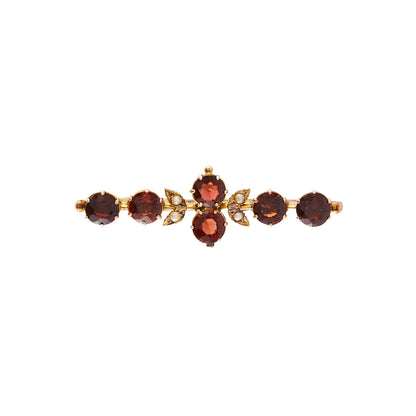 Pretty Edwardian 9ct gold bar brooch, set with six beautifully faceted garnets and four seed pearls. Chester 1910