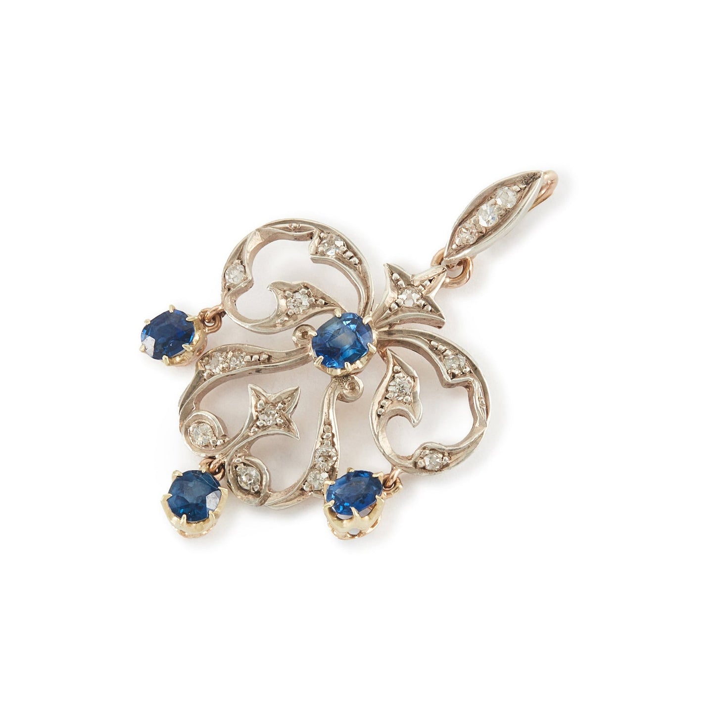 Exquisite Edwardian 9ct gold and silver pendant set with four bright blue sapphires and seventeen small old-cut diamonds.