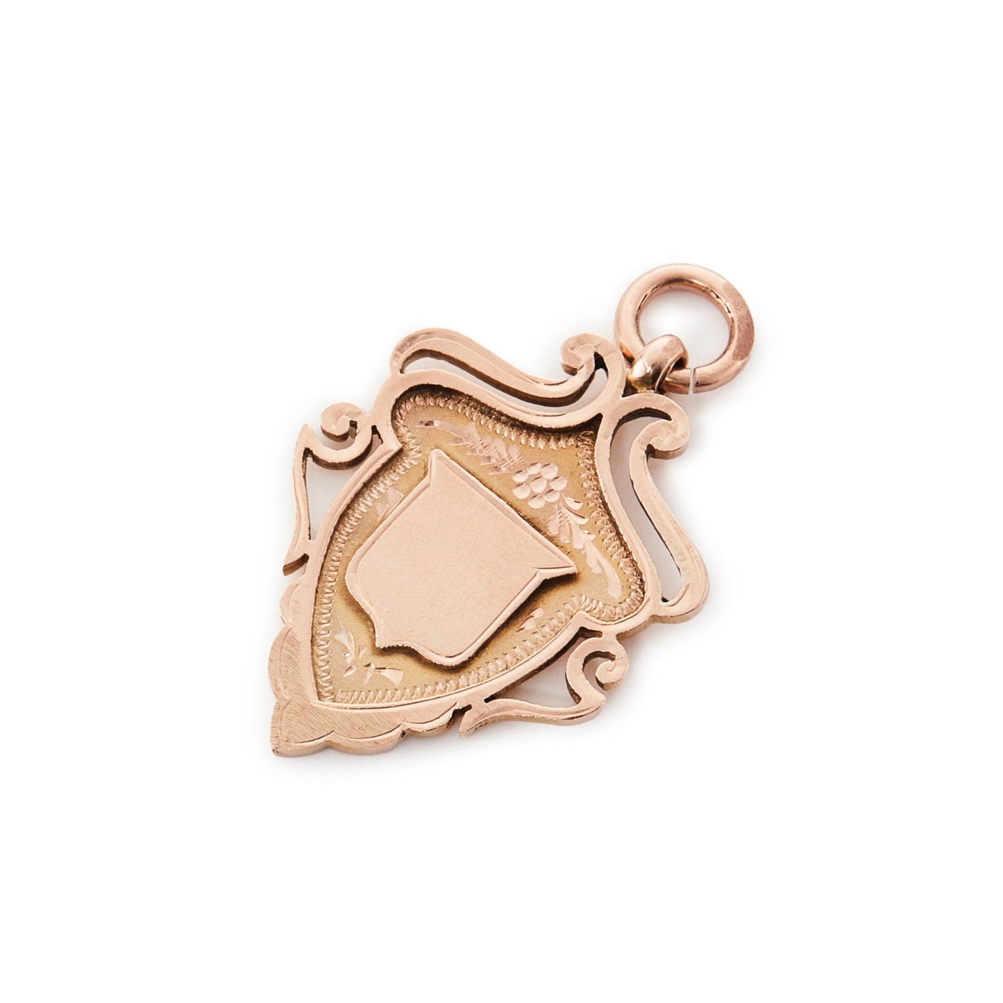 Beautifully engraved Edwardian 9ct rose gold shield shaped medallion.