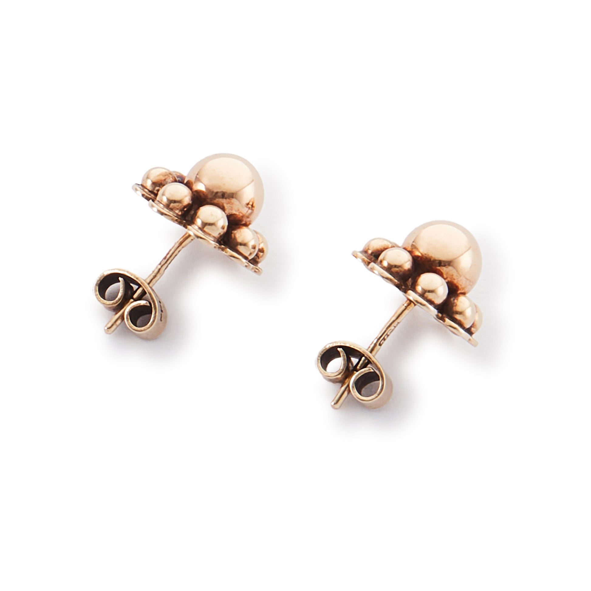 Pretty Edwardian 9ct rose gold stud earrings, each in the shape of a flower.