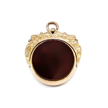 Beautifully engraved Edwardian rose gold swivel fob set with a carnelian and a bloodstone.