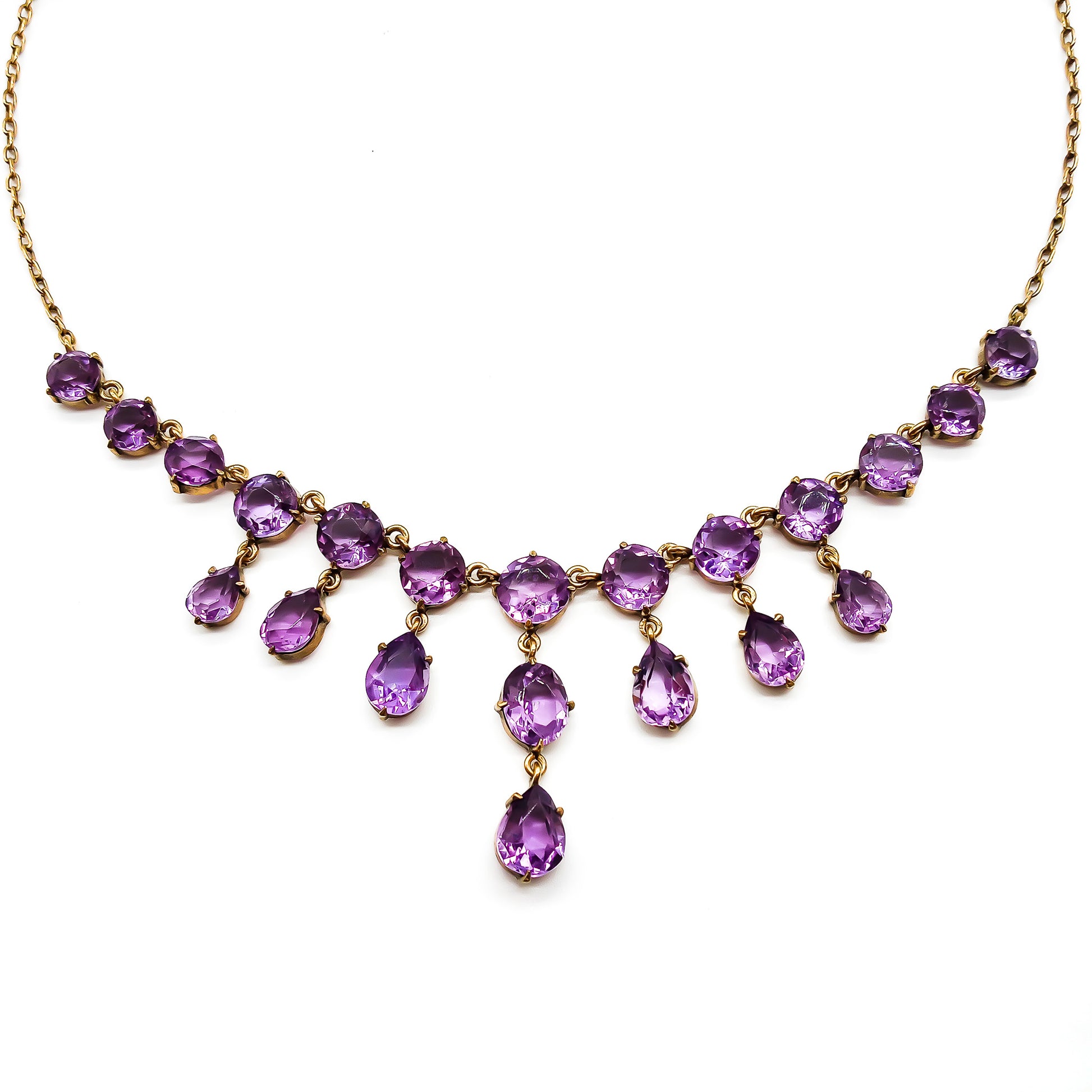 Stunning Edwardian gold plated on silver festoon necklace set with twenty-one beautifully faceted amethysts.