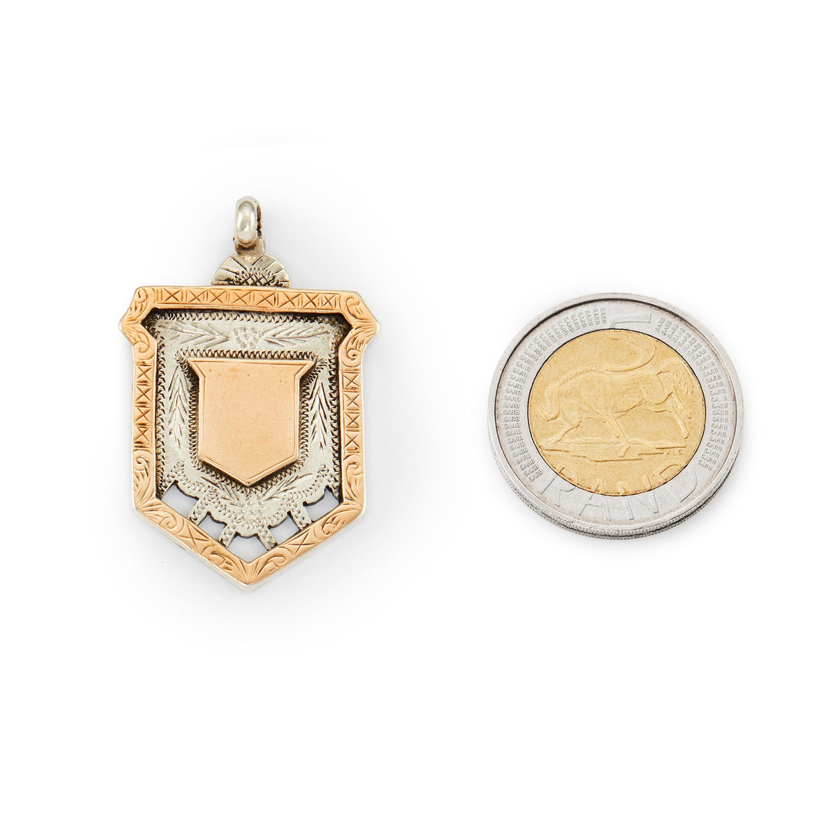 Solid Edwardian rose gold on silver beautifully engraved medallion inscribed with the date 27.4.10 at the back.