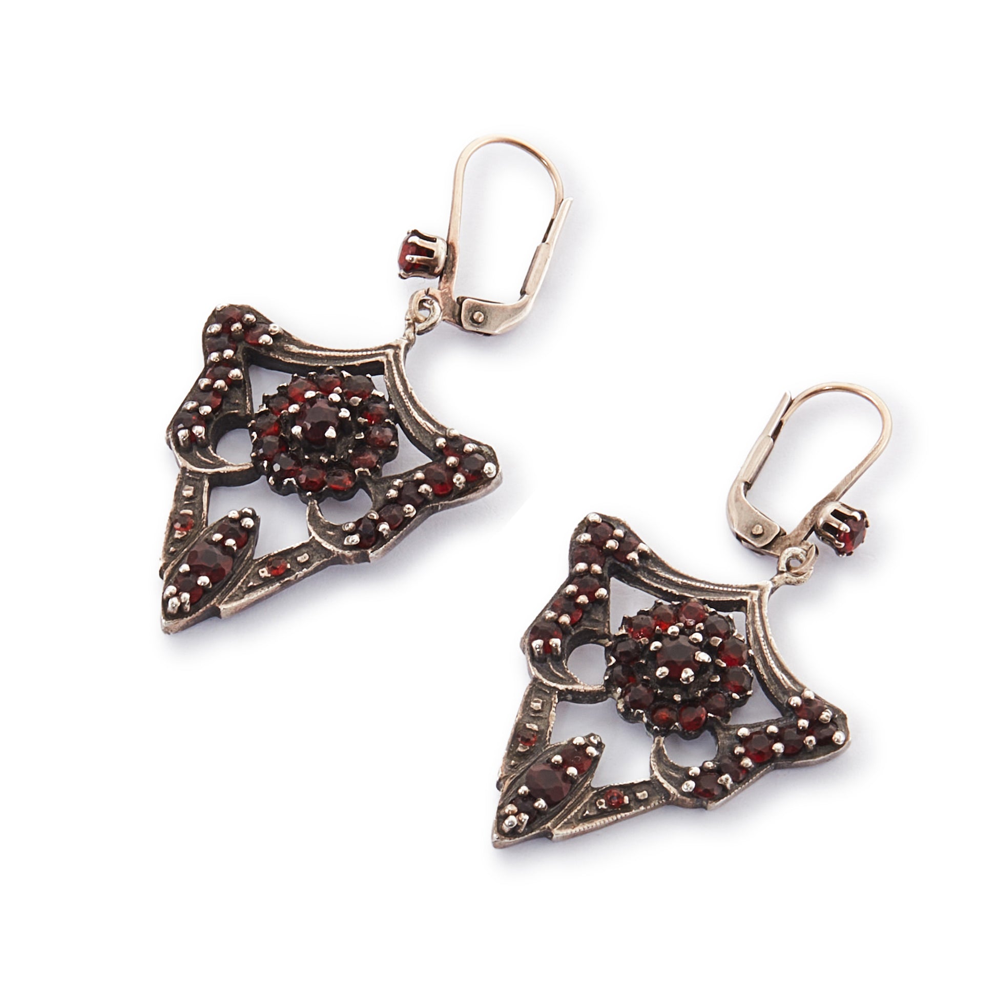 Gorgeous Edwardian silver-gilt, gothic-style earrings set with deep red Bohemian garnets.