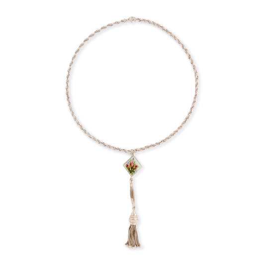 Pretty Edwardian silver albertina necklace with a beautifully enamelled diamond-shaped disc depicting a bouquet of flowers. The disc also has intricate floral engraving at the back. The albertina has a dangling tassel drop.