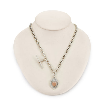 Classic Edwardian sterling silver fob chain with a dog clip, T-bar and a medallion embossed with a heart-shaped rose gold disc.